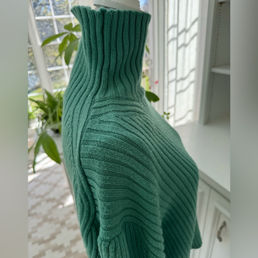 Knitted green sweater